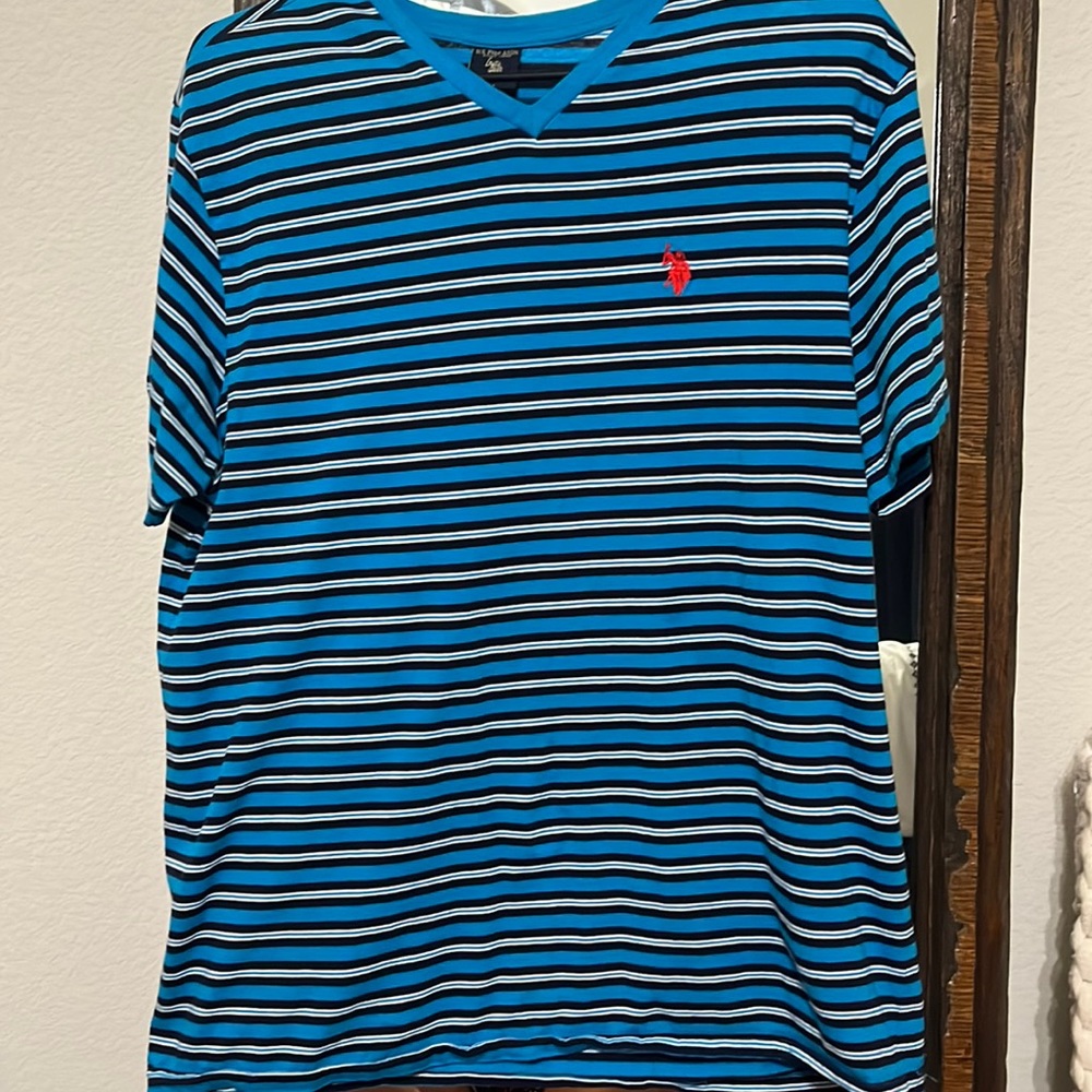 Men’s v neck polo. Blue and navy striped